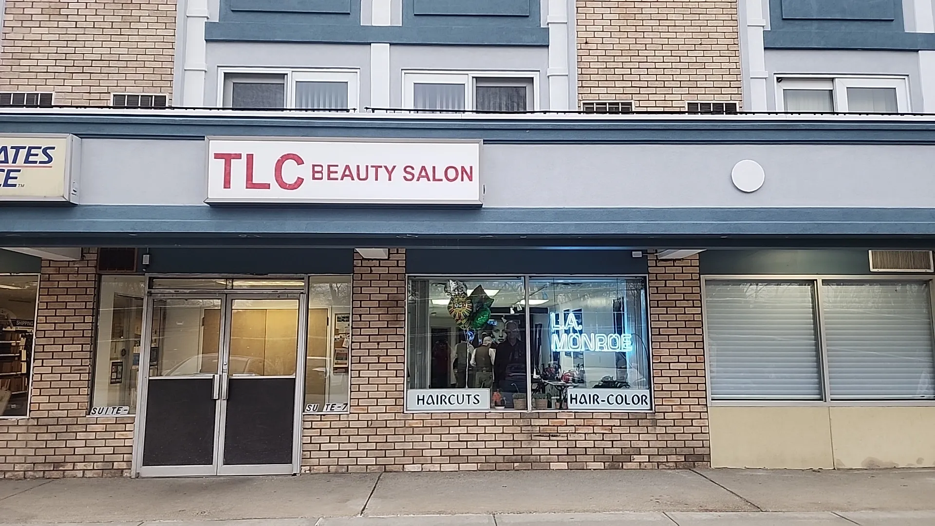 Building exterior at 2042 Albany Post Rd housing LA Monroe Hair Studio in Croton-on-Hudson